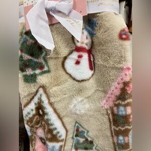 Cupcakes and Cashmere Gingerbread Faux Fur Throw.